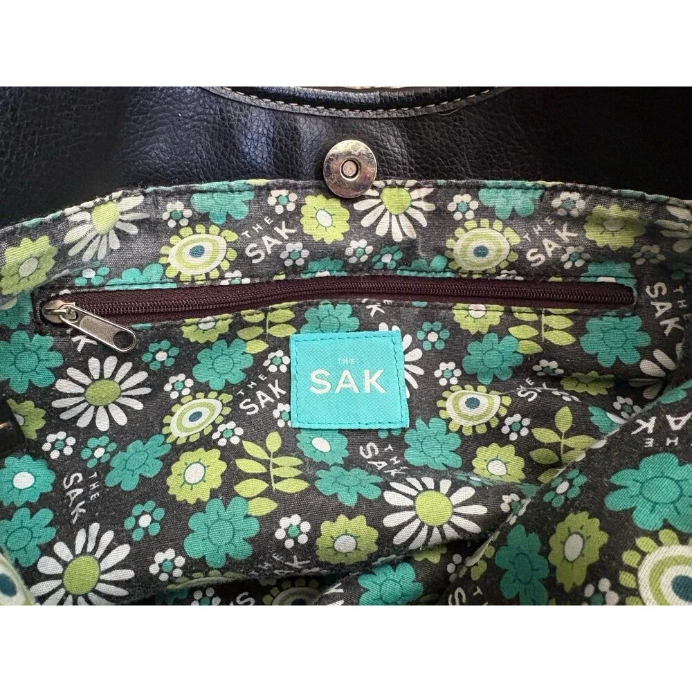 The Sak Black Pebbled Leather Shoulder Bag Buckles Silver Hardware Stitching